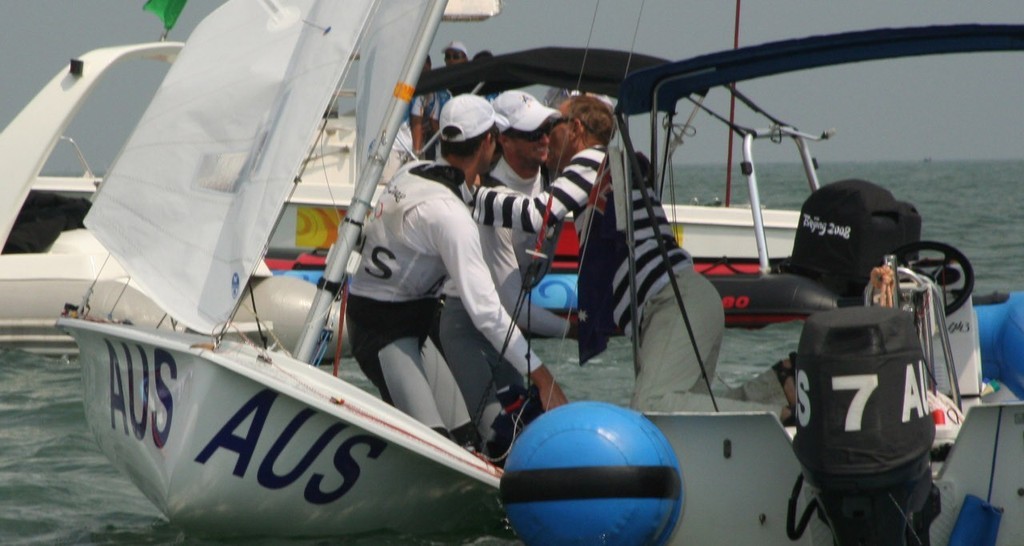 Nathan Wilmot and Malcolm Page (AUS) 470 Class Gold Medal with their coach Victor Kovalenko Olympic 2008 Qingdao © Sail-World.com /AUS http://www.sail-world.com